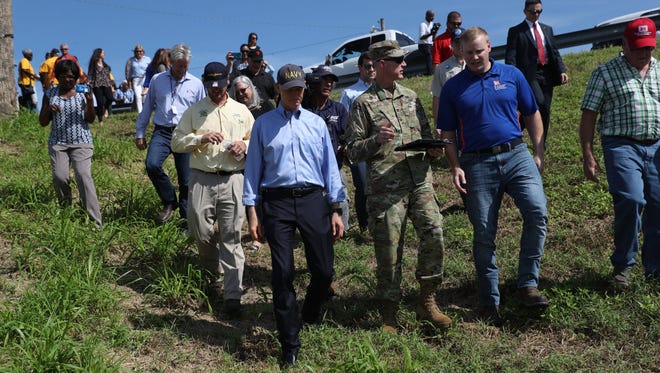 Florida Gov. Rick Scott visited Clewiston on Monday and urged the federal government to help in the restoration of the Herbert Hoover Dike that surrounds Lake Okeechobee. He met with with the Army Corps of Engineers and other dignitaries.  