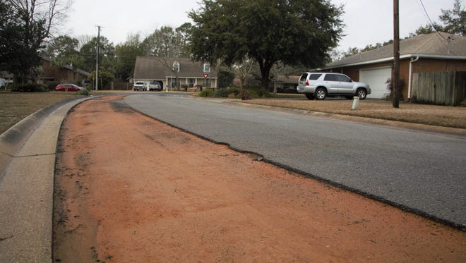 Road pavement lies stripped on Hidden Oaks Drive as part of the city's 1,800 block repaving project on Wednesday, Feb. 7, 2018.