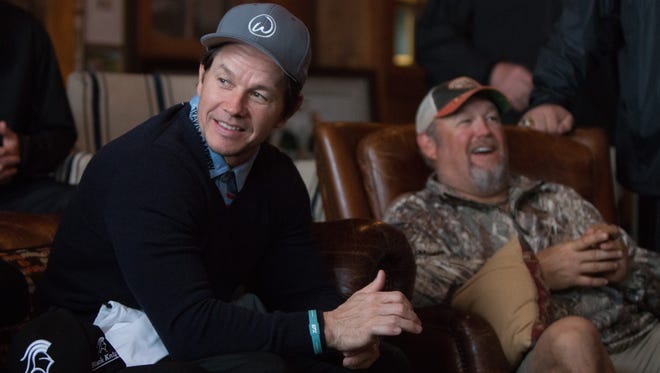 Mark Wahlberg and Larry the Cable Guy sit together prior to the competition on Sunday. The Bass Pro Shops Legends of Golf Celebrity Shootout marked the final day of the Bass Pro Shops Legends of Golf at Big Cedar Lodge.