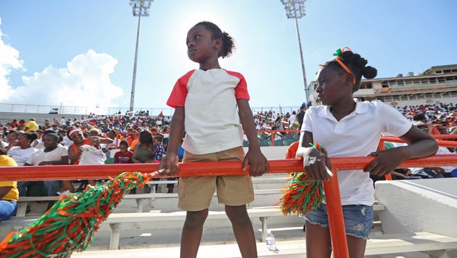 Fans watch as the Rattlers win their home opener over Fort Valley State University. The 6 p.m. kickoff versus Savannah State will help reduce the risk of heat-related ailments.
