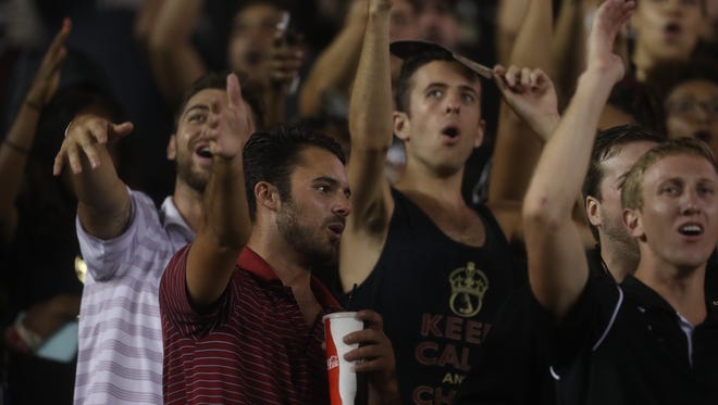 Fans cheer on their team from the stands as the Seminoles take on the Hokies of Virginia Tech at Doak Campbell Stadium on Monday, Sept. 3, 2018. 