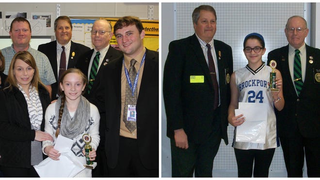 Left photo: Danielle Jewell-Wolf with her family, acting Hill Principal Brandon Broughton and Monroe County Volunteer Firemen’s Association directors Mike Lapinksi and Alan Way. Right photo: Ryan Danielak with Monroe County Firemen’s Association directors Mike Lapinksi and Alan Way. photos provided by BCSD