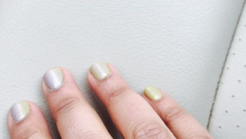 Why is my gel nail polish manicure changing color on one hand?