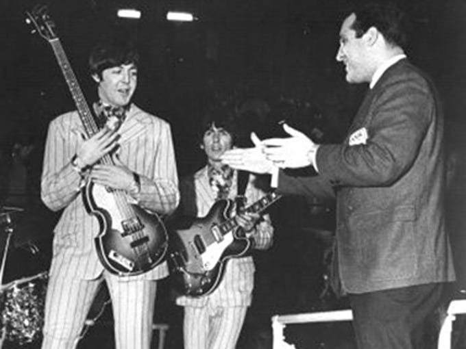 Disc jockey Scott Regen introduces Paul McCartney and