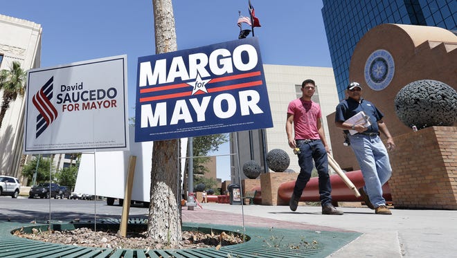 Only a few campaign signs can be seen throughout town for a mayoral election which had a dismal turnout during early voting in El Paso.
