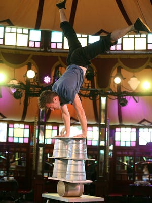 Jan Damm, of Cirque du Fringe, works on his balancing act during a rehearsal for the Miracle Cure show in the Spiegeltent.