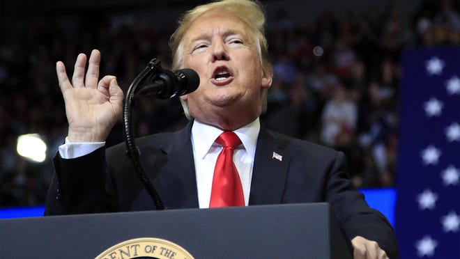 In this March 28, 2019 file photo, President Donald Trump speaks at a campaign rally in Grand Rapids, Mich. The Trump administration and several Republican-led states faced a midnight Wednesday deadline for filing papers with a federal appeals panel reviewing a lower court ruling that the ACA is unconstitutional.