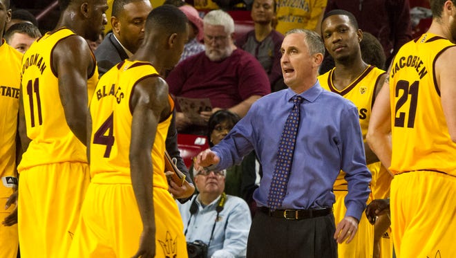Arizona State men's basketball coach Bobby Hurley talks to his team during a game against Texas A&M at Wells Fargo Arena in Tempe on Dec. 5, 2015.