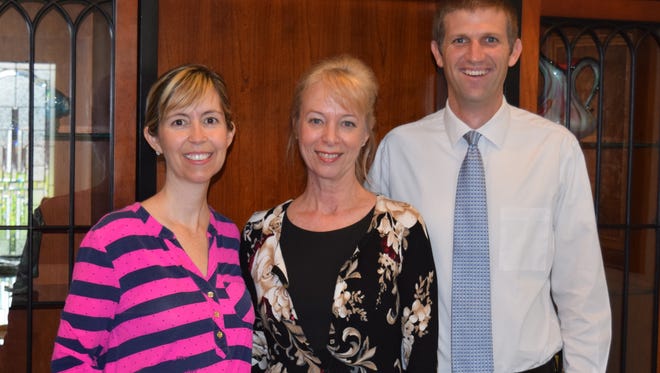 Two 2015-16 Employee Pillar of Character Award recipients: Elizabeth Hunter (left) and Bryan McLaughlin with their boss, Sheila Biehl (center), from the Law Offices of Sheila Biehl