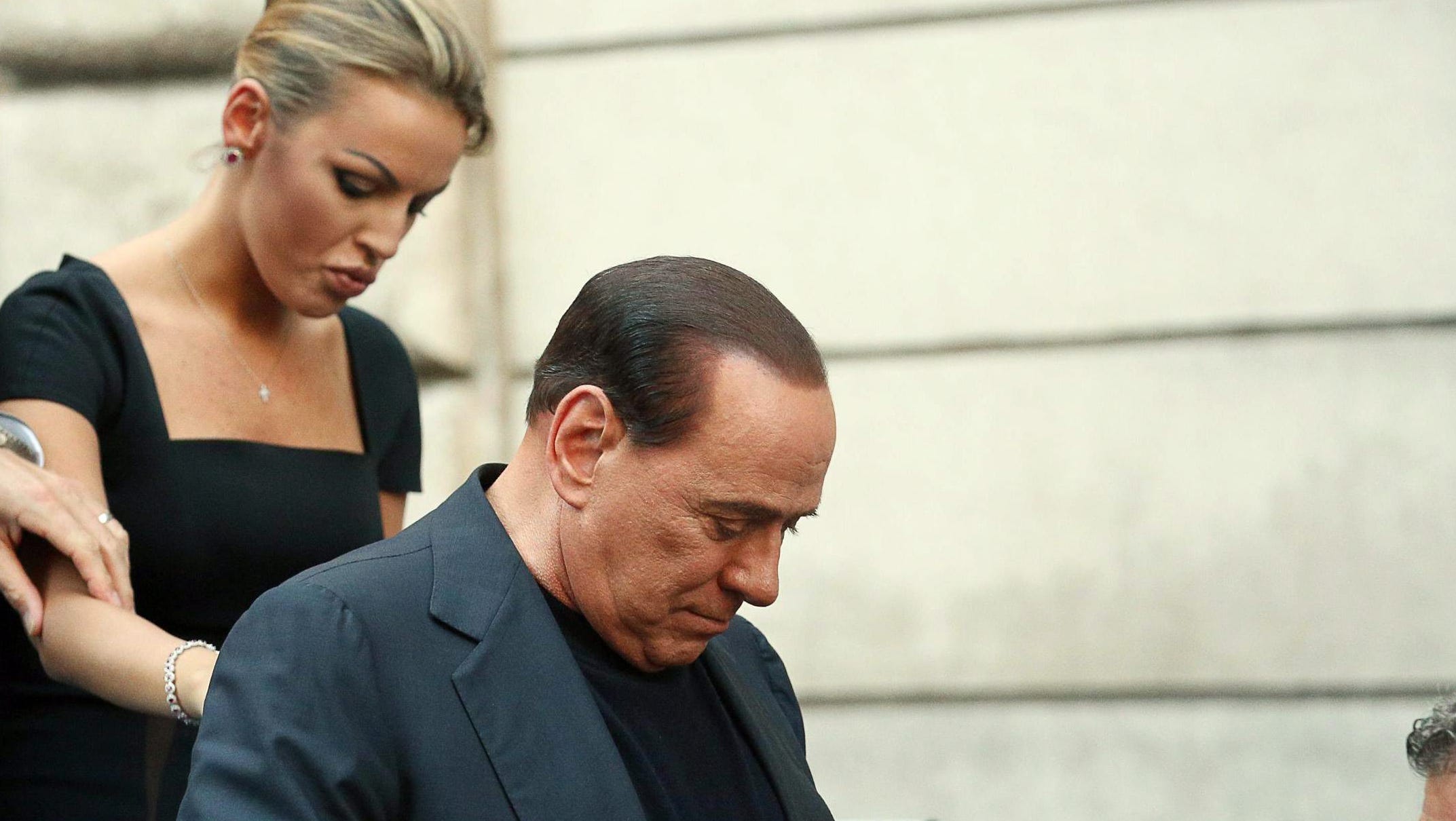 Berlusconi's 28-year-old girlfriend: I courted him