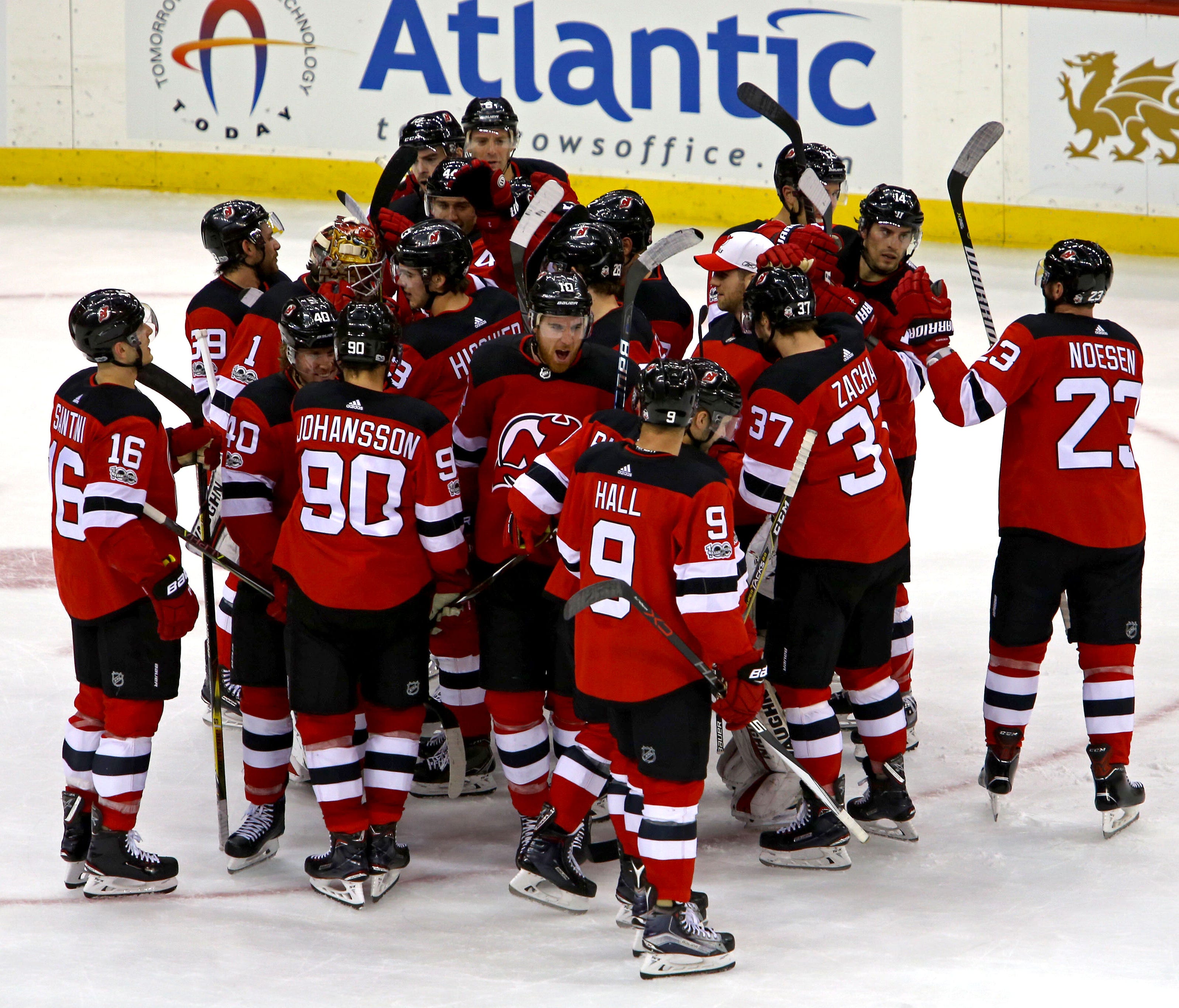 The New Jersey Devils celebrate after beating the Ottawa Senators 5-4 in a shootout at Prudential Center.