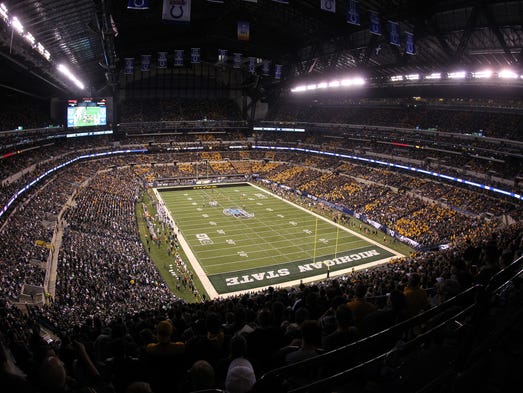 Football fans watch the Big Ten Championship game between