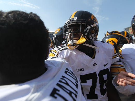 Iowa's James Daniels celebrates the Hawkeyes' 44-41