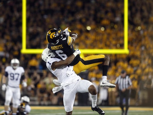 Iowa wide receiver Ihmir Smith-Marsette pulls in a