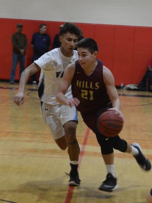 Joey Belli (21) led Wayne Hills past Wayne Valley in the Passaic County boys basketball semifinals at Kennedy on Saturday, Feb. 17.
