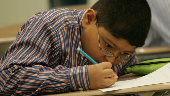 A student works on a test during class. Christian Brothers Academy in Middletown for DITLO, Tuesday, October 5, 2010.