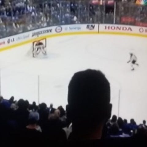 The head of a Maple Leafs fan blocked the main...