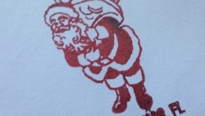 At the Christmas Post Office, customers can stamp their cards with inked holiday greetings and get a Christmas postmark from ZIP code 32709.
