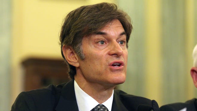 Mehmet Oz, vice chairman and professor of surgery, Columbia University College of Physicians and Surgeons, testifies on Capitol Hill in Washington in June, 2014.