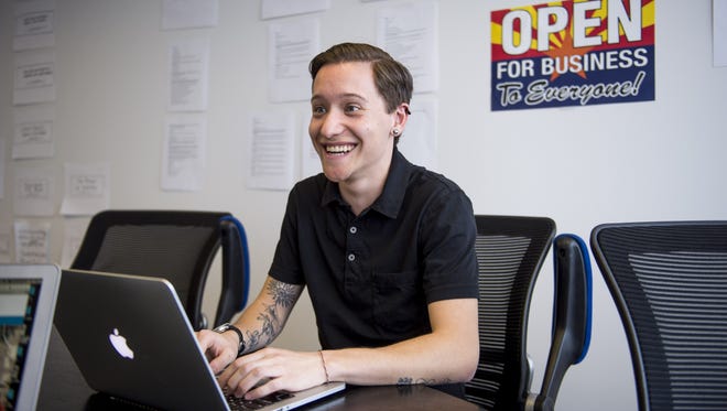 Ashton Skinner works at the offices of OH Partners in Phoenix on March 3, 2017. Skinner is the transgender-outreach coordinator for One Community, an organization that promotes diversity and inclusion.