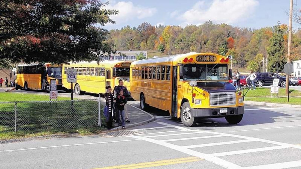 Buses leave Washingtonville High School.