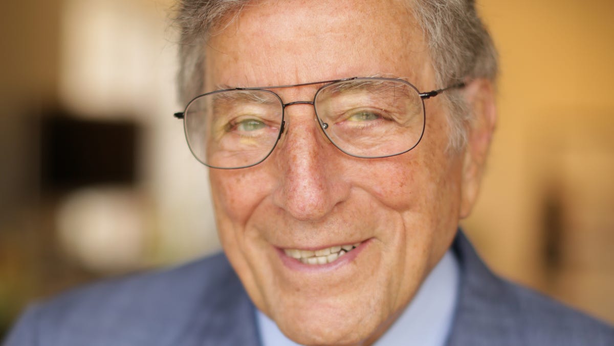 Legendary jazz and popular music crooner Tony Bennett celebrates his 90th birthday on Aug. 3, 2016. He gets ready for a portrait session, in New York, in this 2014 photo.