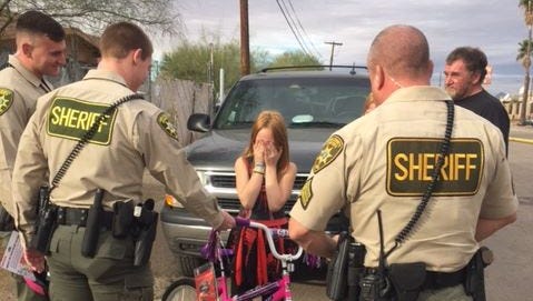 Pima County Sheriff's Department deputies surprised a girl with a new bike after she lost hers in a fire on Jan. 9, 2018.