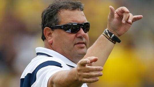 Michigan football coach Brady Hoke looks on from the sideline while playing the Utah Utes on Saturday, Sept. 20, 2014, at Michigan Stadium in Ann Arbor.