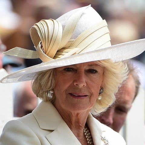 She looks elegant with or without a hat!