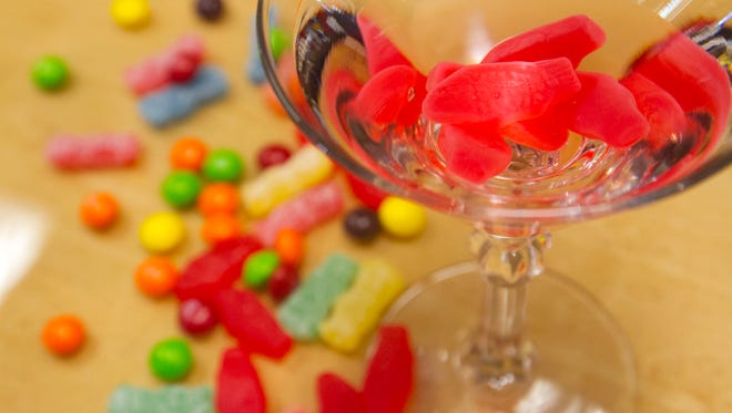 The frozen candy martini has Mr. Tom's Vodka and triple sec garnished with frozen candy.