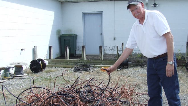 Ronnie Wallace, owner of Wallace Supply in Indian Mound, shows the copper wire recovered by the Stewart County Sheriff's Office after rolls of the precious wire were stolen over the Labor Day weekend. SCSO arrested four suspects within two days.