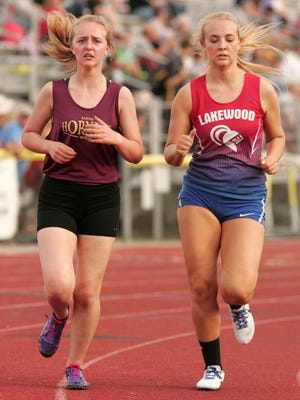 Licking Heights sophomore Hannah Swisher runs in the 1,600 on May 12 during the Licking County League-Buckeye Division meet.