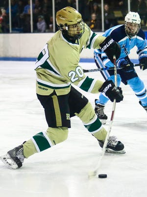 Wes Smith scores a second-period goal for Howell in a 7-1 victory over Ann Arbor Skyline.