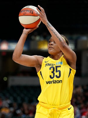 Indiana Fever guard Victoria Vivians (35) puts up a three-point attempt in the first half of their WNBA preseason basketball game at Bankers Life Fieldhouse on Monday, May 7, 2018. 