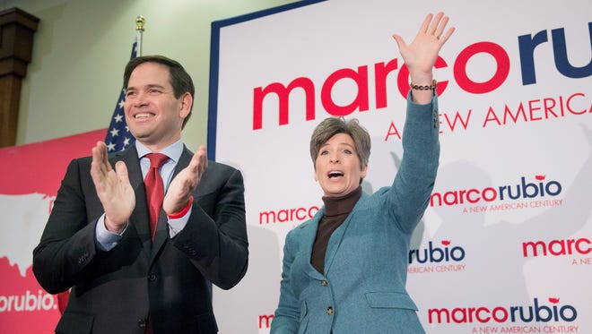 Sen. Marco Rubio campaigns with Sen. Joni Ernst at a rally on Jan 25, 2016 in Des Moines, Iowa.