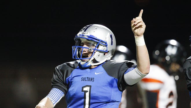 Bagdad junior Israel Loveall (1) celebrates after a touchdown in the third quarter in the 1A state championship game against Williams at Maricopa High School in Maricopa on Saturday, Nov. 12, 2016.
