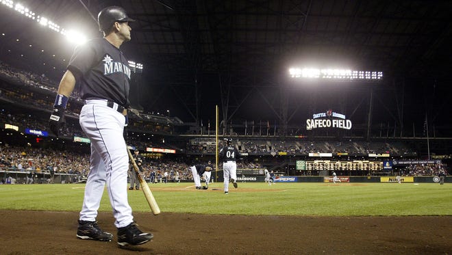 Seattle Mariners designated hitter Edgar Martinez is shown near the on-deck circle at Safeco Field during the 2004 season, which was the last of his 18-year career.