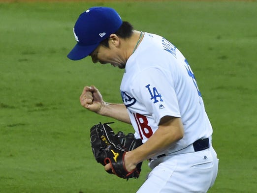 Game 6 at Dodger Stadium: Kenta Maeda celebrates after