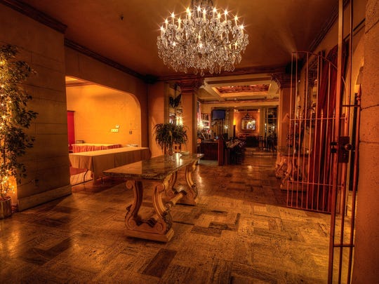 Who haunts Phoenix's Hotel San Carlos?