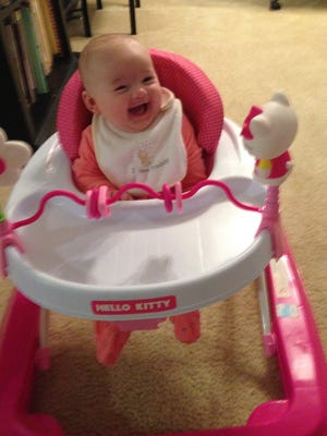 Isabella couldn't have been happier when she got her first ride on her new Hello Kitty walker. She has smiles like this all the time.