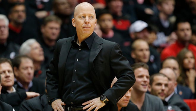 Cincinnati Bearcats head coach Mick Cronin paces the sideline in the second half during the 84th annual Skyline Chili Crosstown Shootout basketball game between the Xavier Musketeers and the Cincinnati Bearcats, Thursday, Jan. 26, 2017, at Fifth Third Arena in Cincinnati.