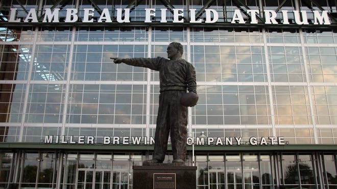 The statue of Curly Lambeau in front of the Lambeau Field atrium is an ode to the team's founding father.