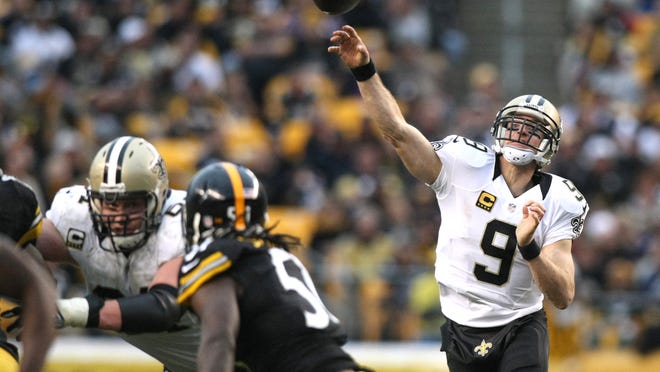 Saints quarterback Drew Brees throws a pass against the Pittsburgh Steelers on a day when he fired five touchdown passes on the road at Pittsburgh’s Heinz Field.