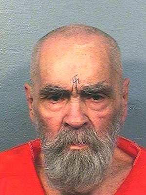FILE - This Aug. 14, 2017, file photo provided by the California Department of Corrections and Rehabilitation shows Charles Manson. The fight over the estate of apocalyptic cult leader Manson has fragmented into at least three competing camps that could cash in on songs he wrote that were used by The Beach Boys and Guns N’ Roses. A Los Angeles judge on Monday, Jan. 8, 2018, will begin trying to sort out at least two conflicting wills and claims to his estate by a purported son, grandson and pen pal. Manson died at 83 in November 2017. (California Department of Corrections and Rehabilitation via AP, File)