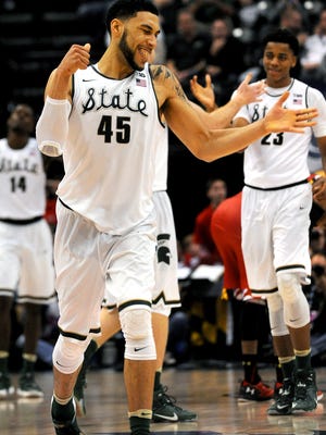 Michigan State's Denzel Valentine celebrates after being fouled with less than a second to play in MSU's 64-61 Big Ten tournament semifinal win over Maryland Saturday in Indianapolis.
