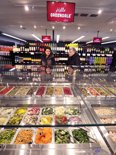 A salad bar, olive bar, wines and more are offered