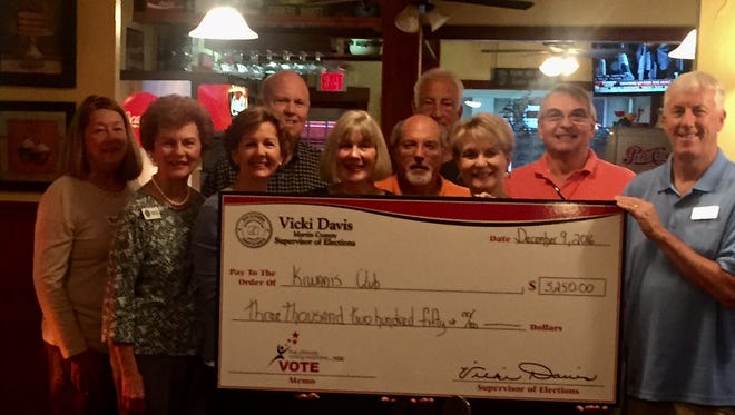 Martin County Supervisor of Elections Vicki Davis and members of Kiwanis Club, during their check presentation for working the polls.