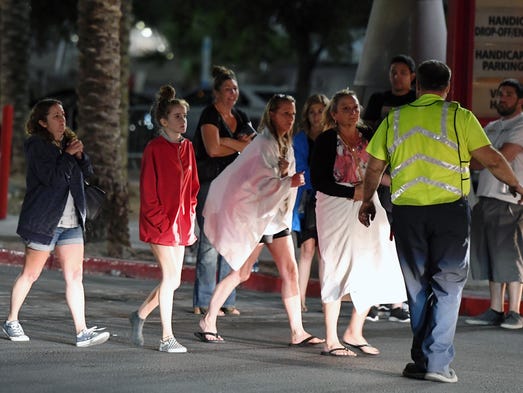 People are directed to rides outside the Thomas  Mack