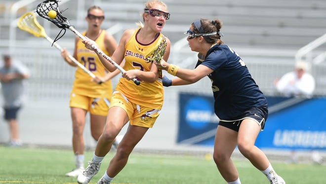 Salisbury University's Courtney Fegan looks to pass against Trinity (Conn.) College on Sunday, May 20, 2018, during the NCAA Division III lacrosse quarterfinals at Seagull Stadium.