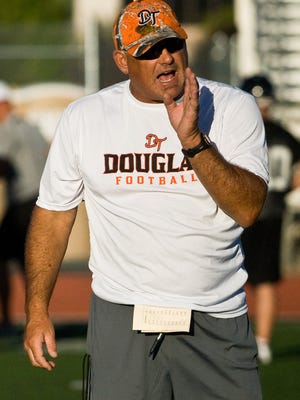 Mike Rippee yells to Douglas football players during a 2010 practice.
Rippee is the new president of the NNFCA.